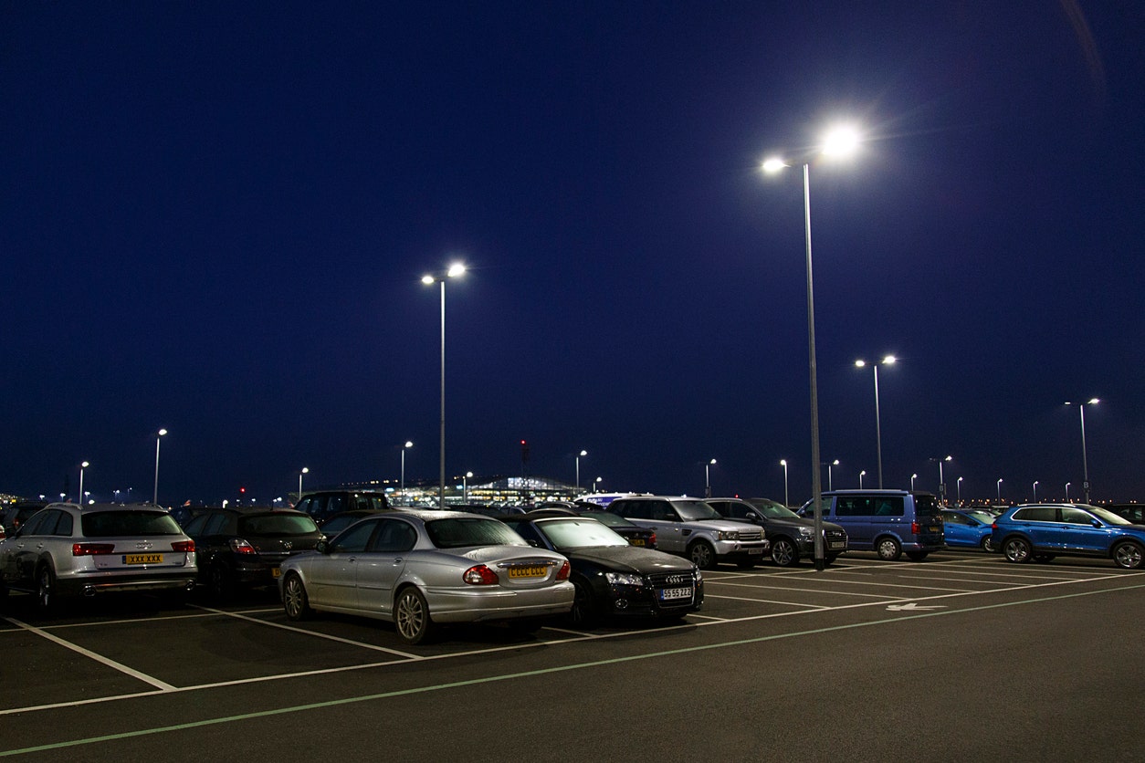 LED area lights in a parking lot at night